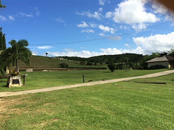 The great lawn beneath the hillside sign